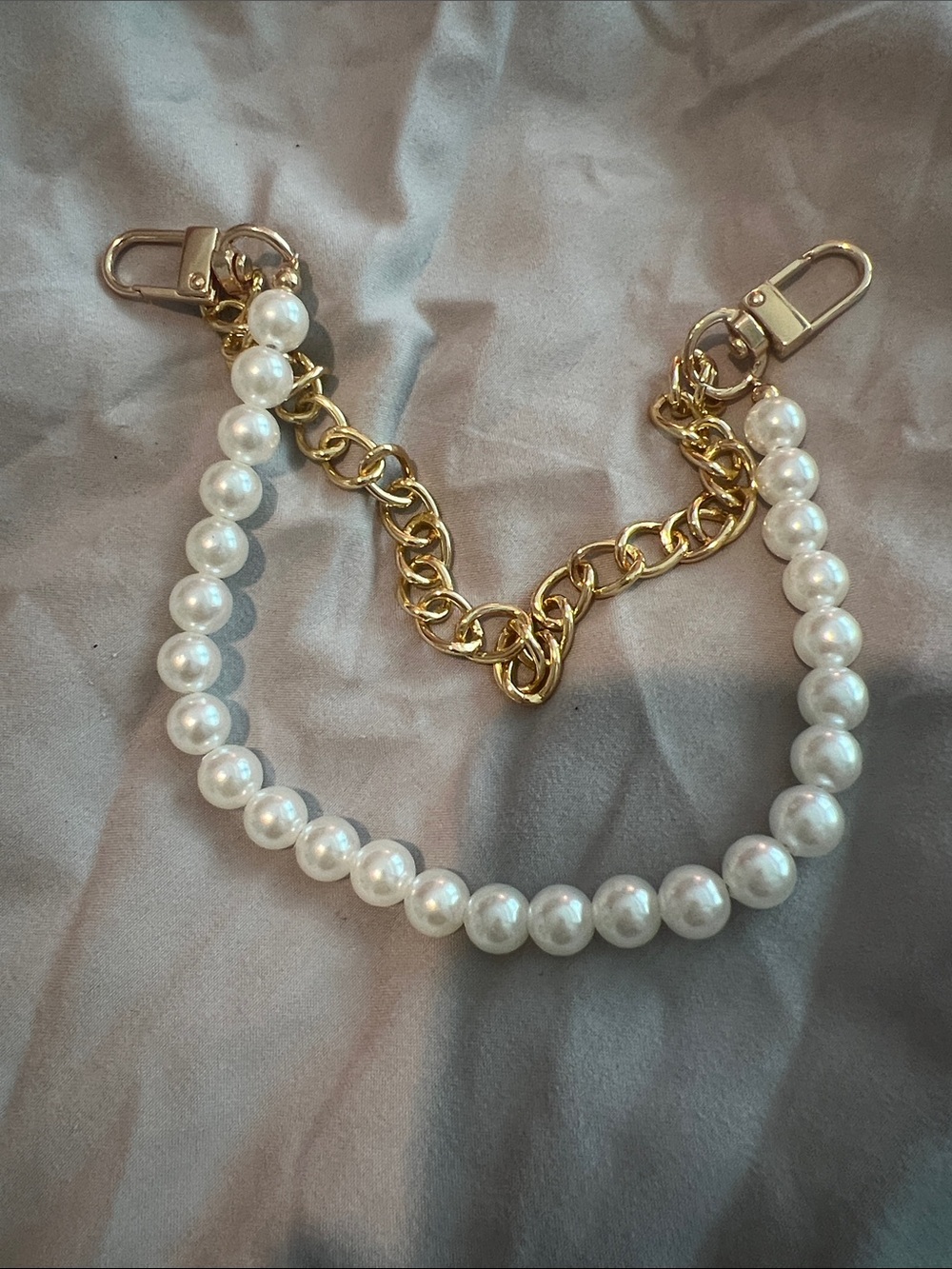 Beginning Boutique Gold Chain and White Pearl Strap bag charm